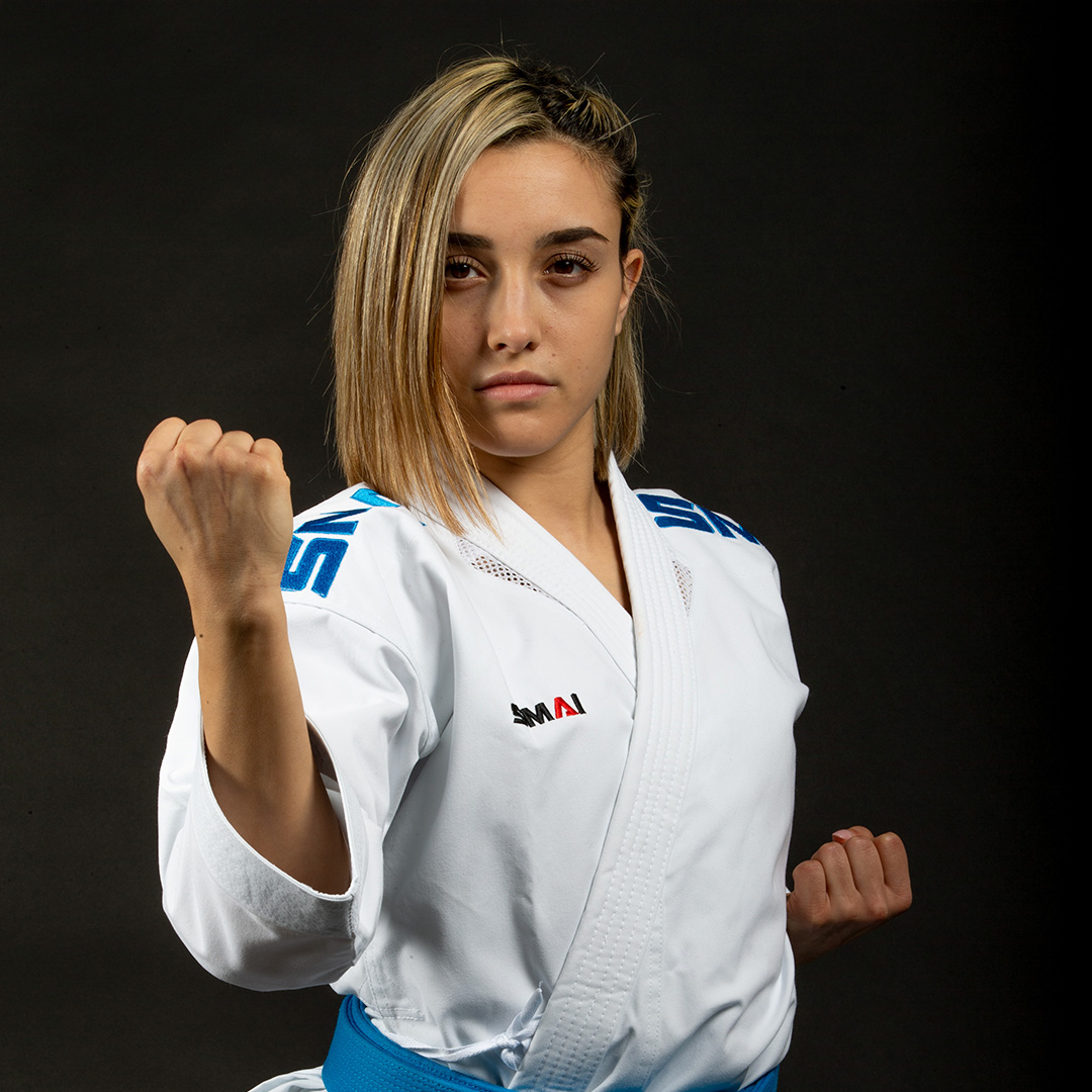 Image of person squatting with a barbell